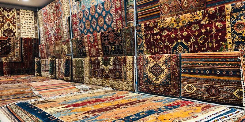 Wicker chair on blue rug